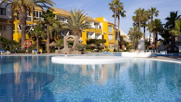 Indoor pool, outdoor pool, pool umbrellas, sun loungers