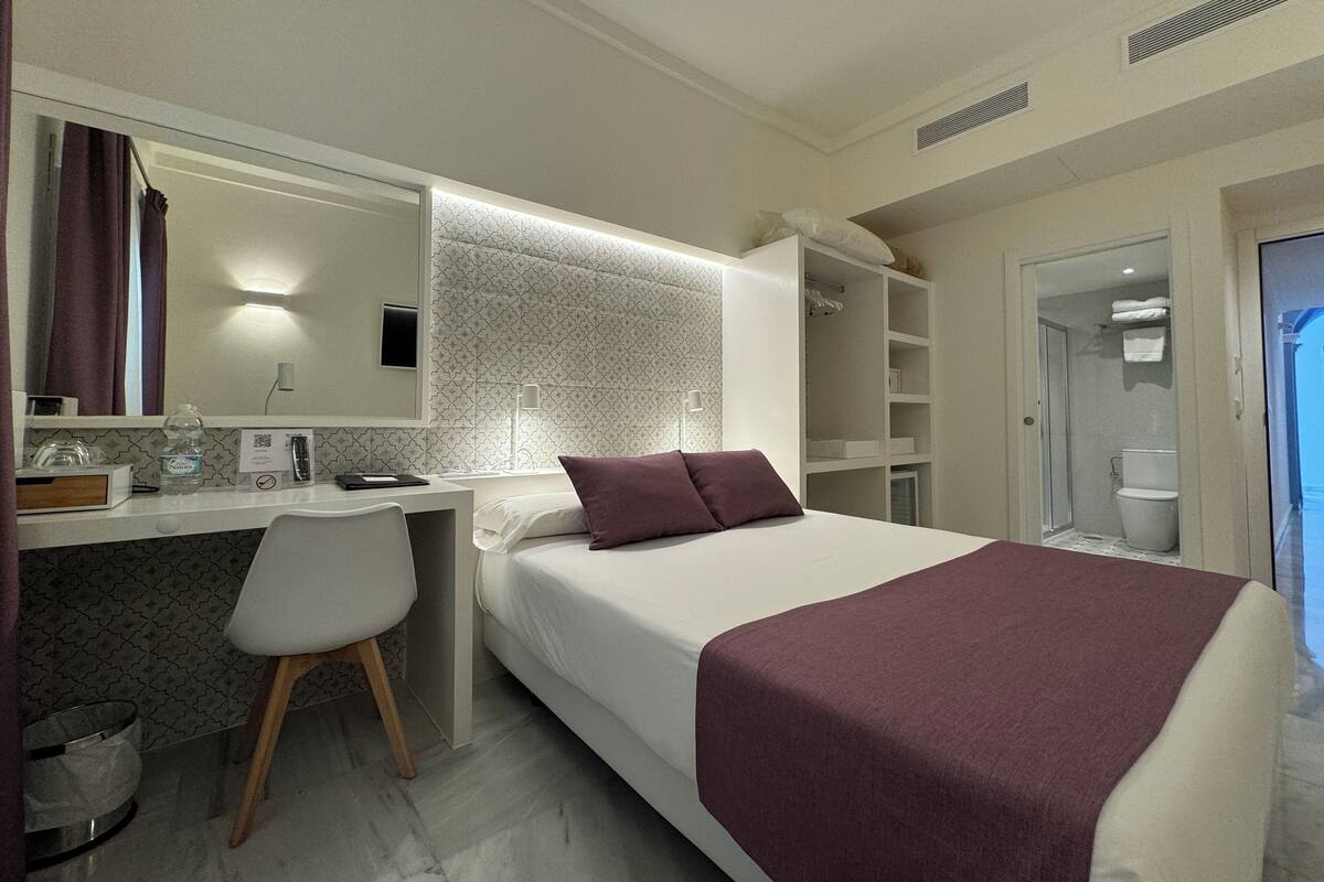 Premium bedding, down duvets, Select Comfort beds, minibar