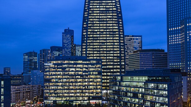 A high-rise building with multiple floors and a modern architectural design, featuring numerous windows and a prominent vertical structure. - Residhome Courbevoie La Défense (Courbevoie)