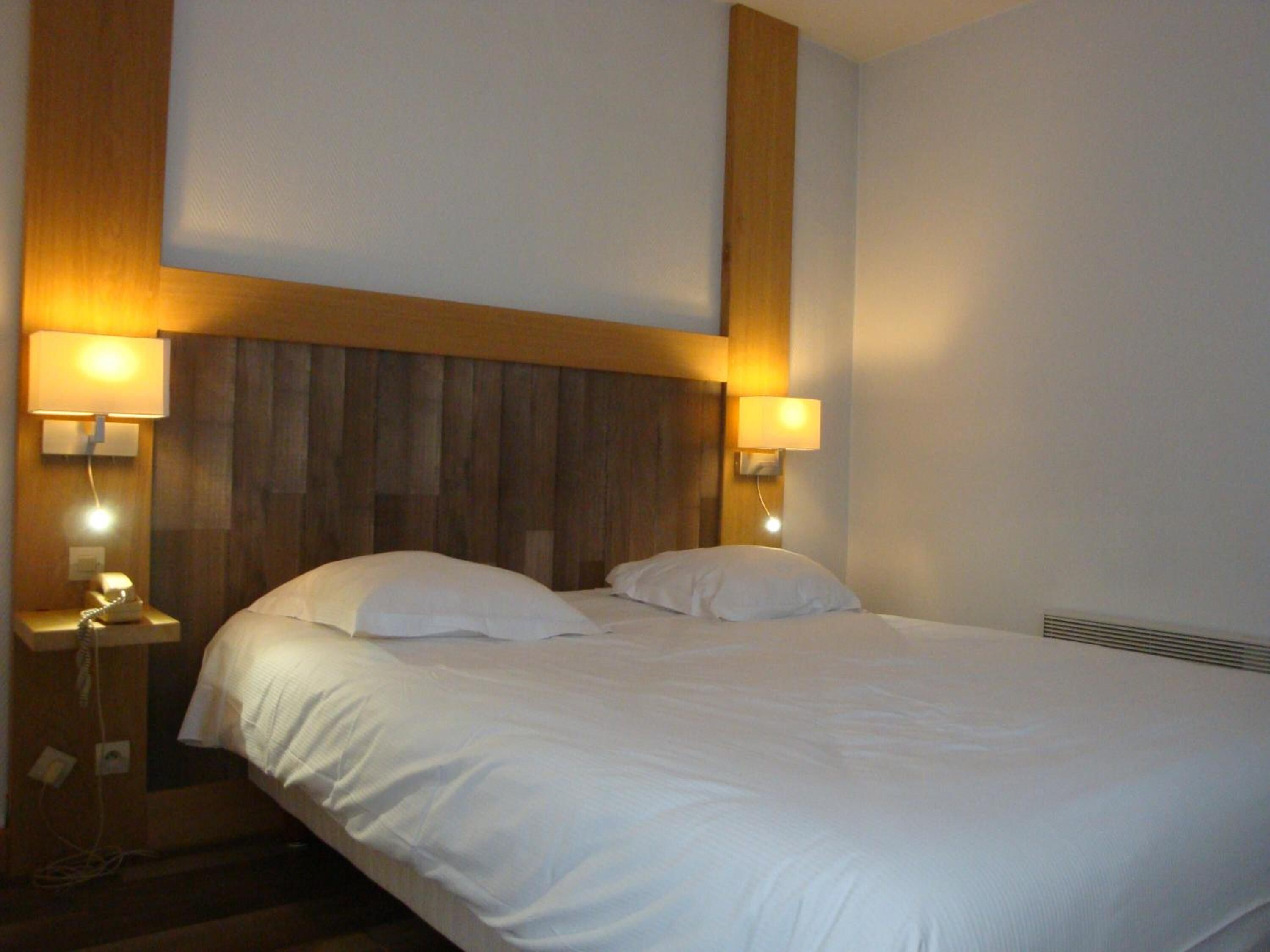 premium bedding, desk, iron/ironing board, free wifi