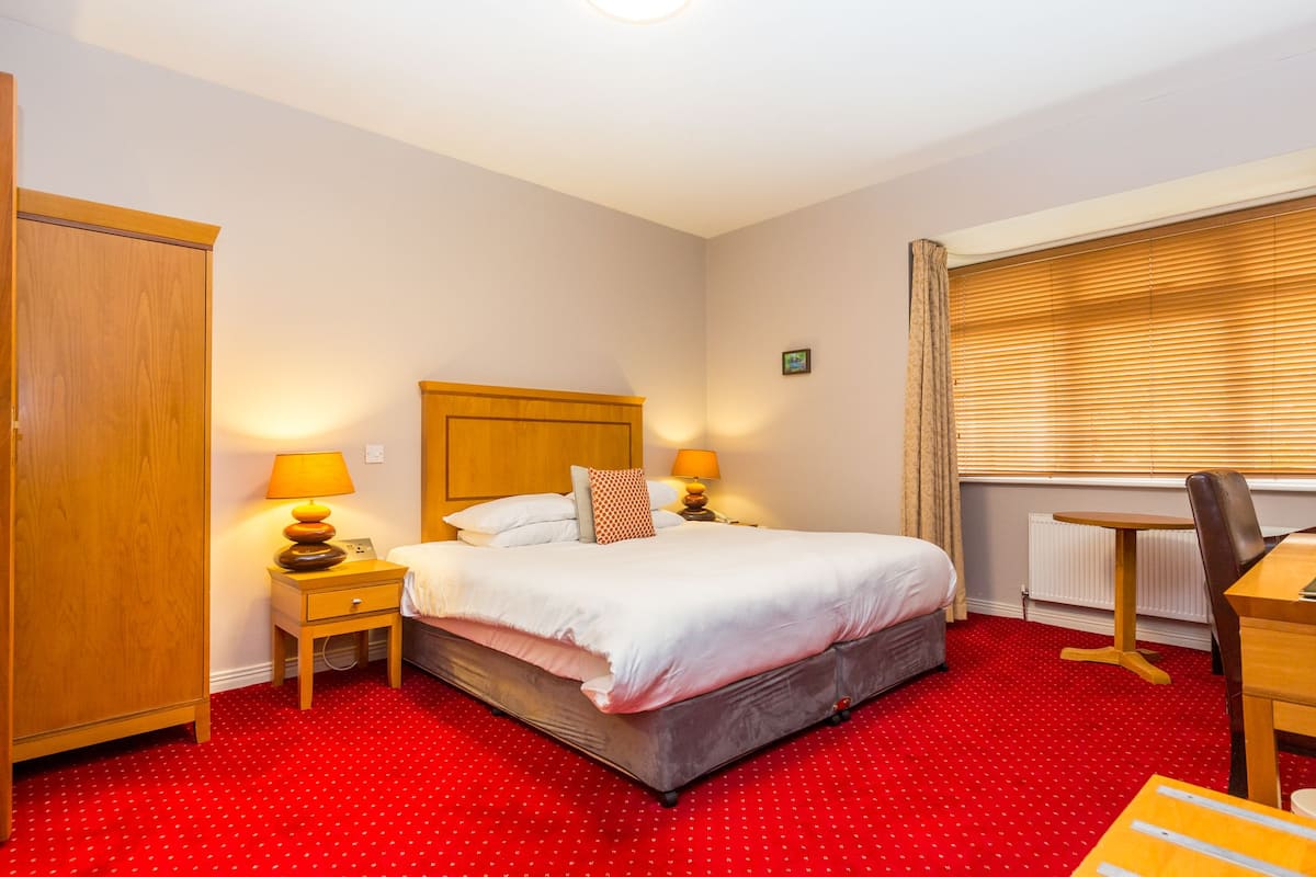 Premium bedding, memory foam beds, in-room safe, desk