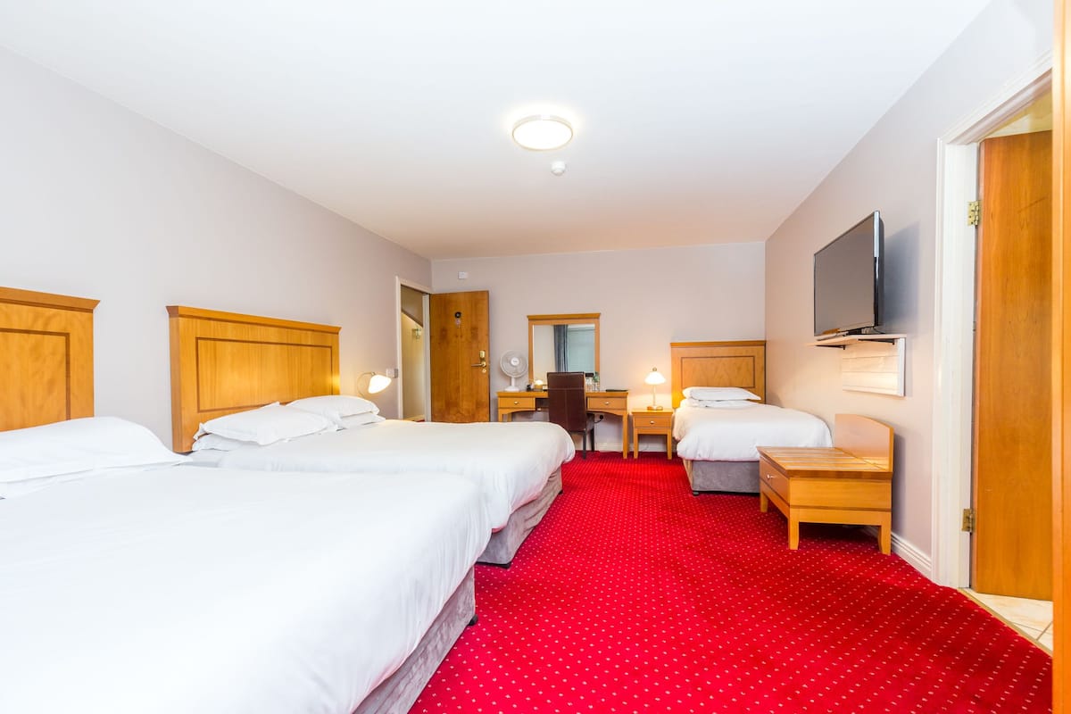 Family Room (Max 3 Adults) | Premium bedding, memory foam beds, in-room safe, desk