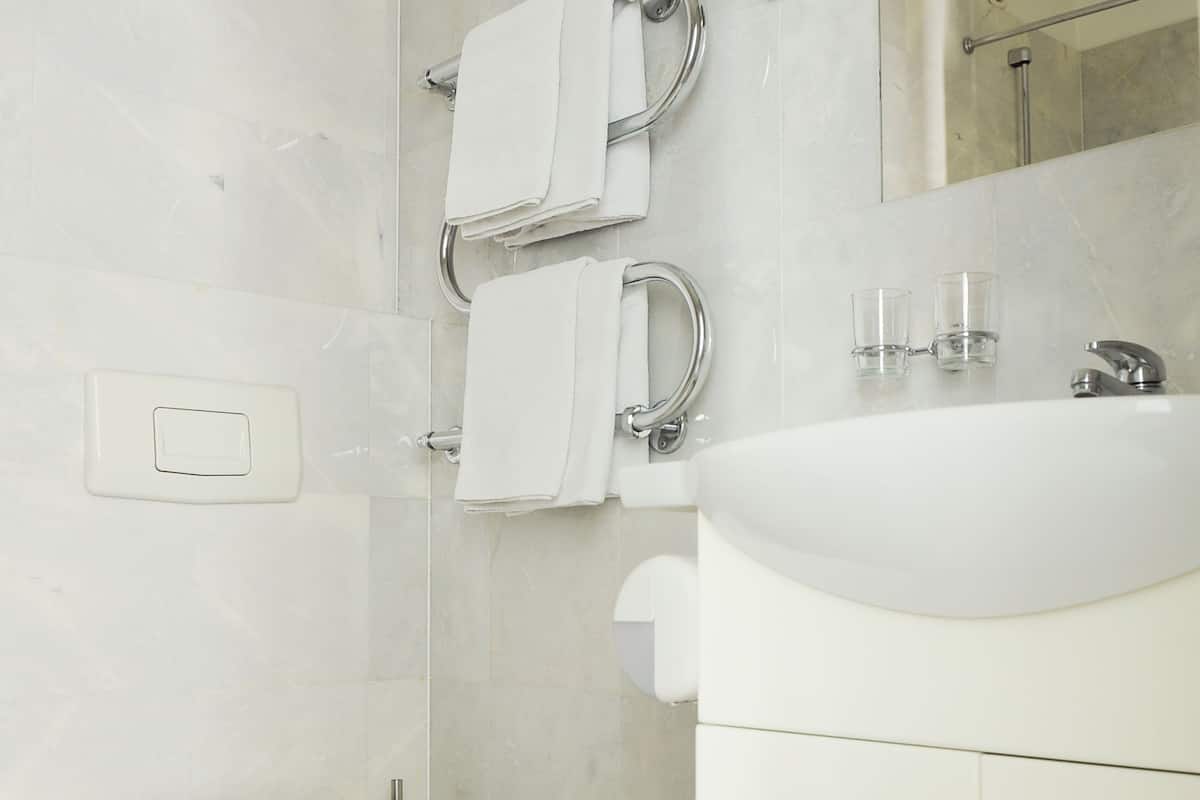 free toiletries, hair dryer, towels, shampoo