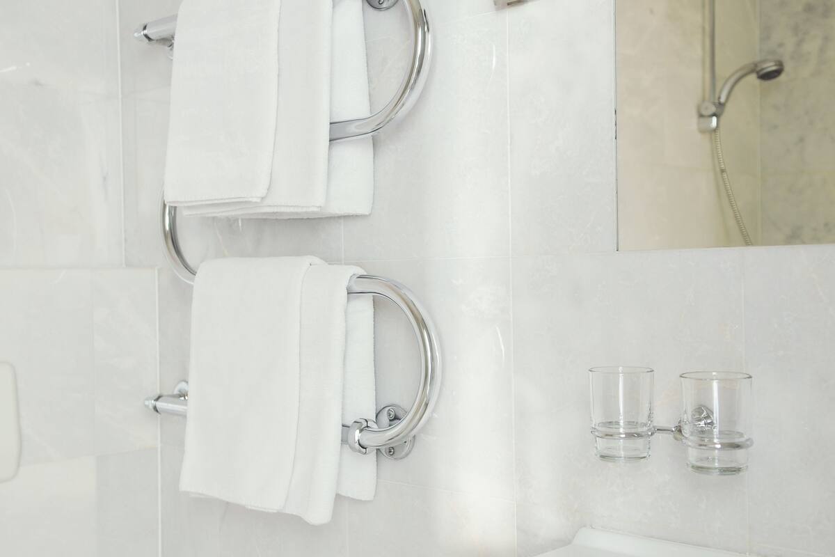 free toiletries, hair dryer, towels, shampoo