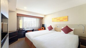 A hotel room with two beds, a desk, a chair, a TV, and a shower. - Hotel JAL City Kannai Yokohama (Yokohama)