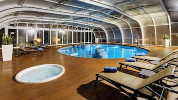 Indoor pool, outdoor pool, pool umbrellas, pool loungers