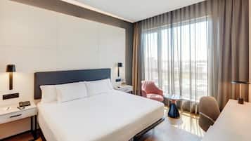 Ropa de cama de alta calidad, cubrecamas y minibar