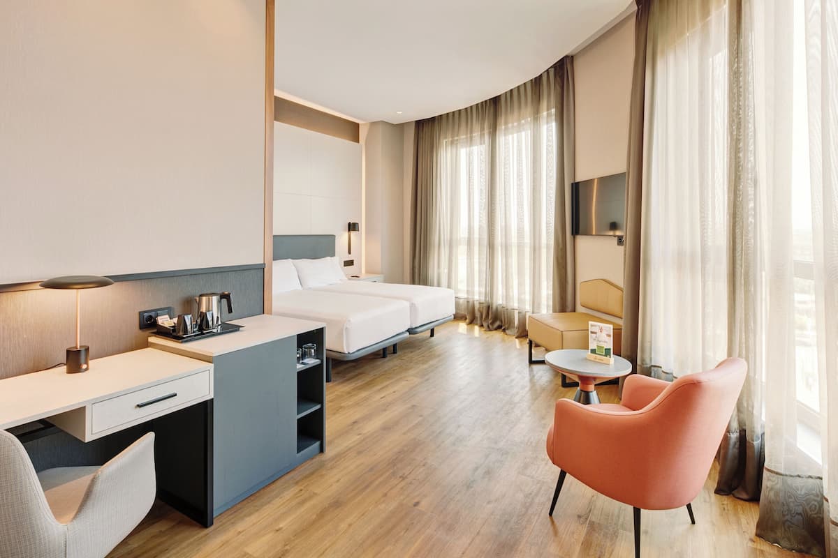 Premium bedding, down comforters, minibar, in-room safe