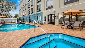 Outdoor pool, pool umbrellas, pool loungers