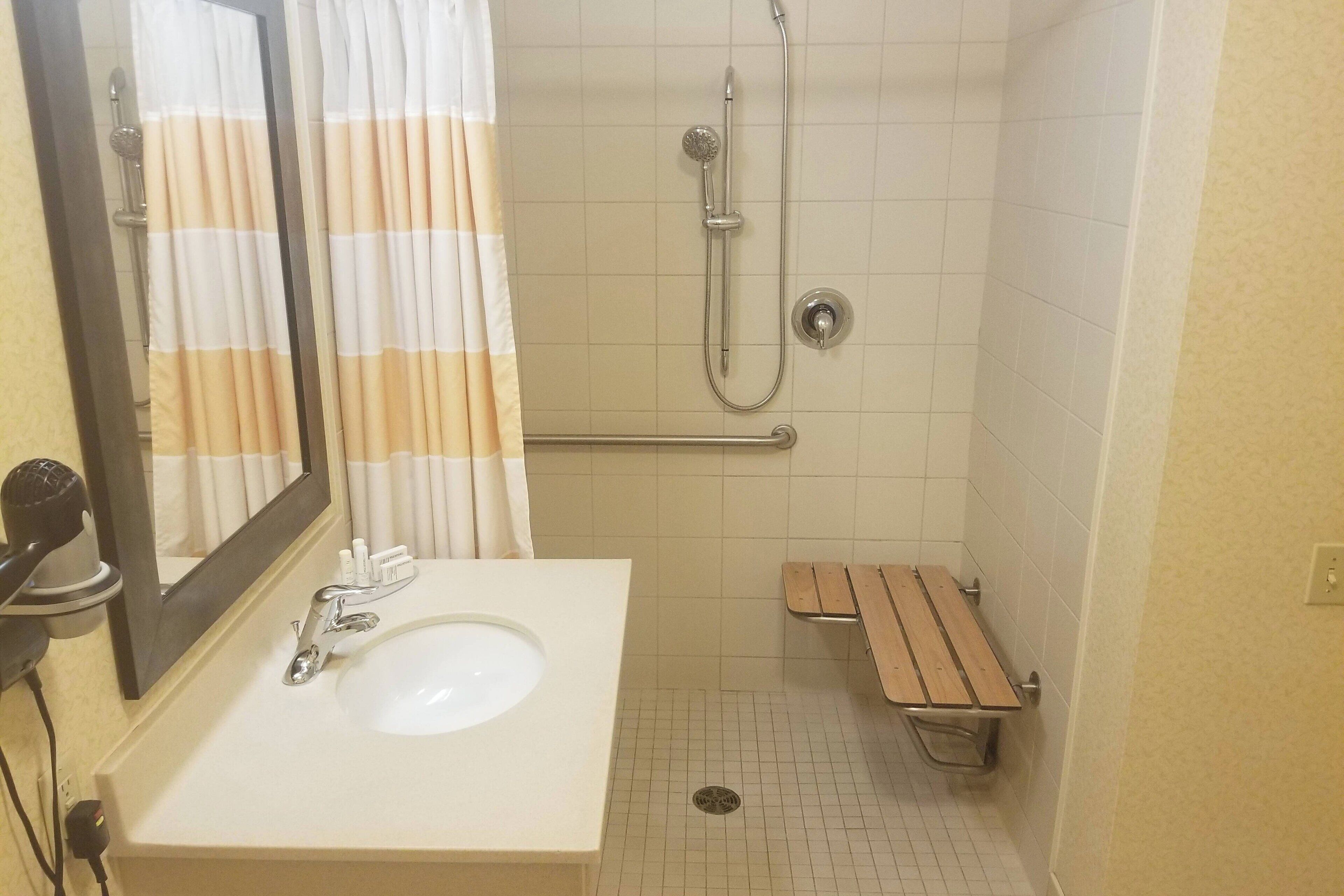 room, 2 queen beds | bathroom | free toiletries, hair dryer, towels