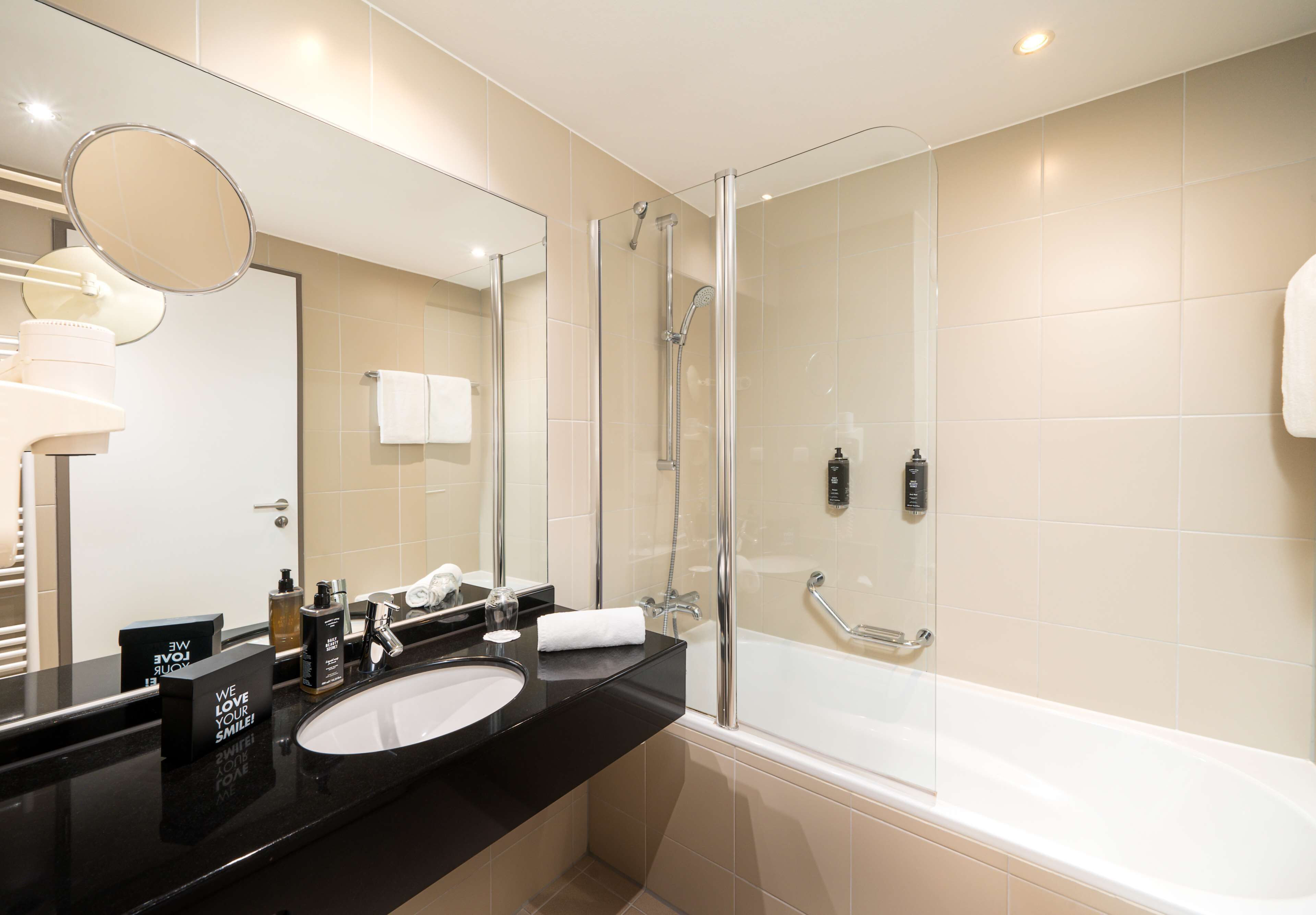 single room with courtyard view | bathroom | free toiletries, hair dryer, towels, soap