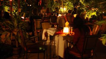 Breakfast, lunch served; local and international cuisine, pool views