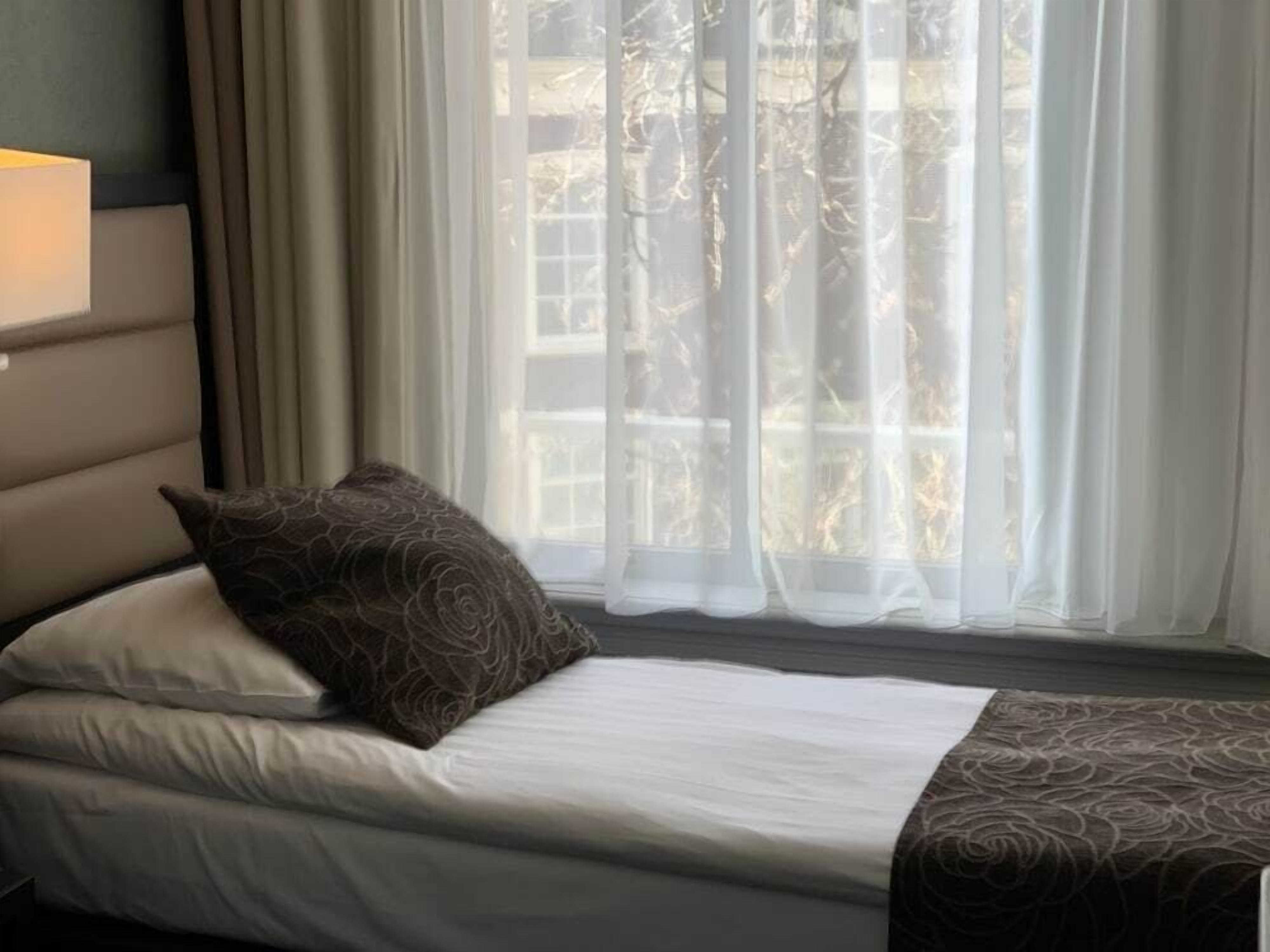 In-room safe, desk, blackout curtains, iron/ironing board