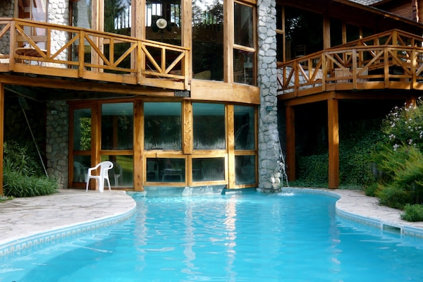 Seasonal outdoor pool, open 11:00 AM to 9:00 PM, pool umbrellas