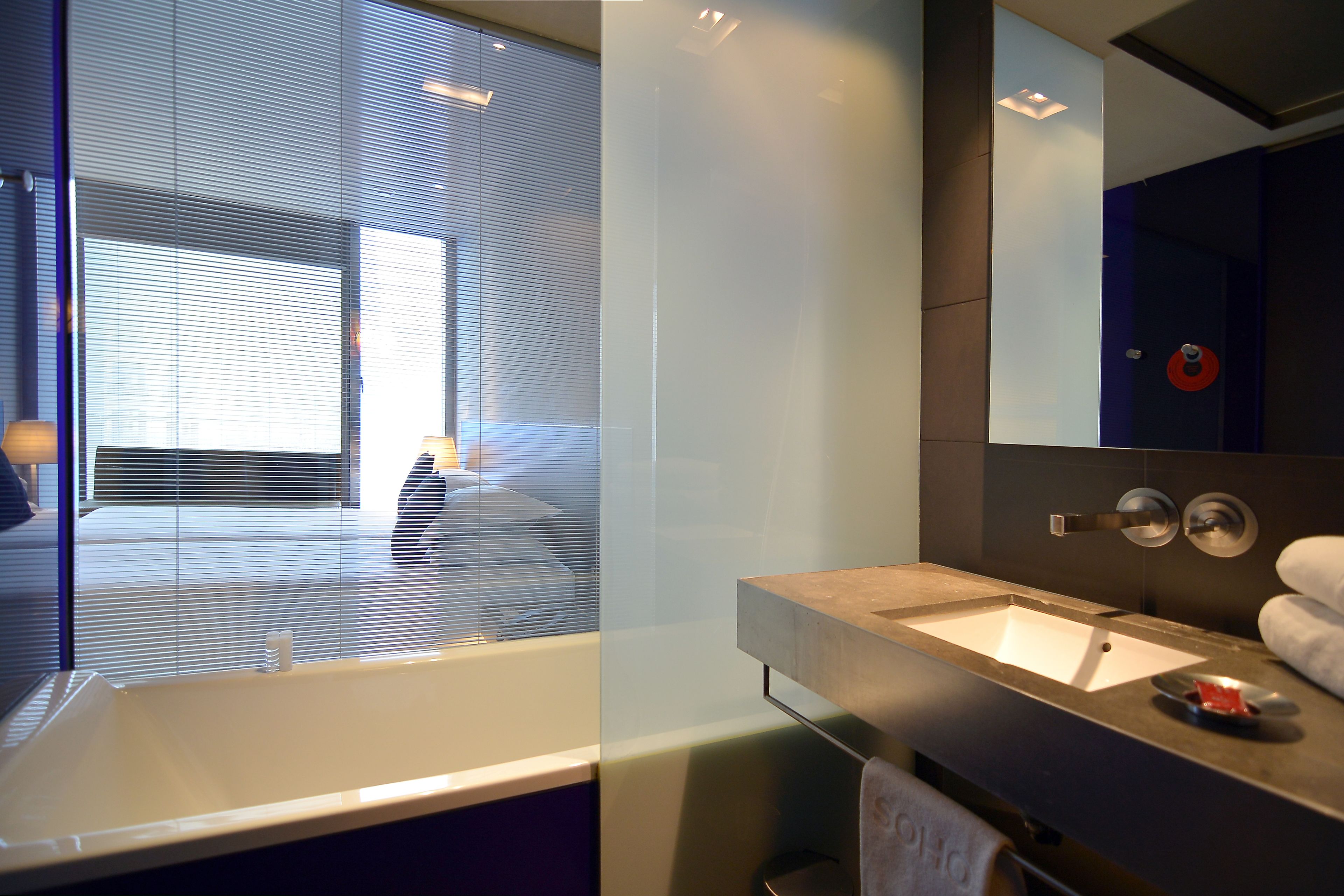 standard room | bathroom | combined shower/bathtub, designer toiletries, hair dryer, slippers