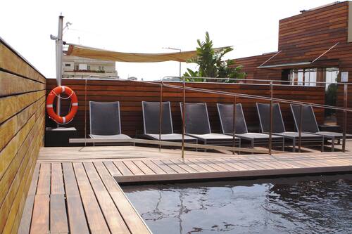 Seasonal outdoor pool, open 9:00 AM to 7:00 PM, sun loungers