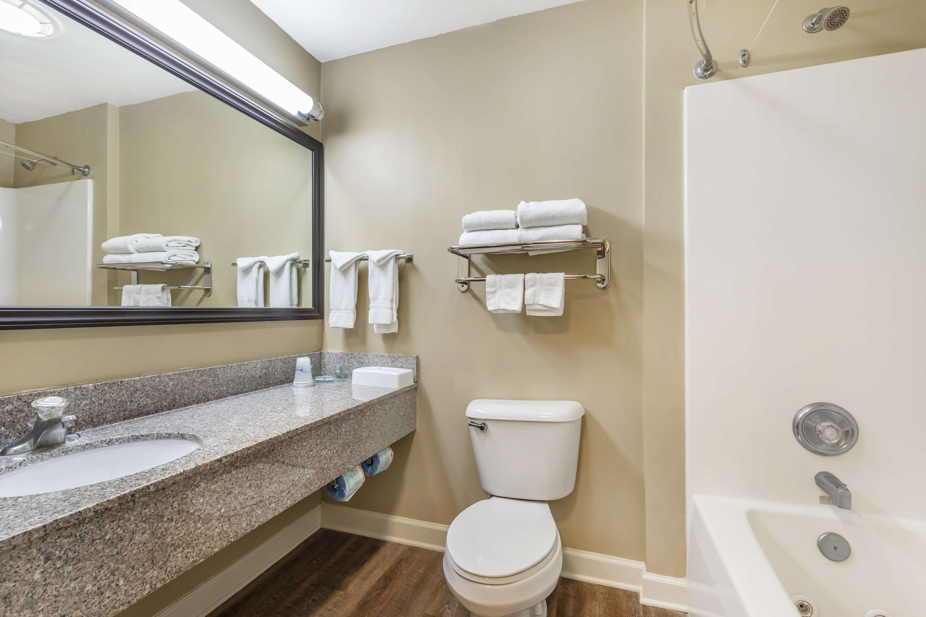 suite, 2 queen beds, non smoking, refrigerator & microwave (third bed is a sofabed) | bathroom | combined shower/bathtub, free toiletries, hair dryer, towels