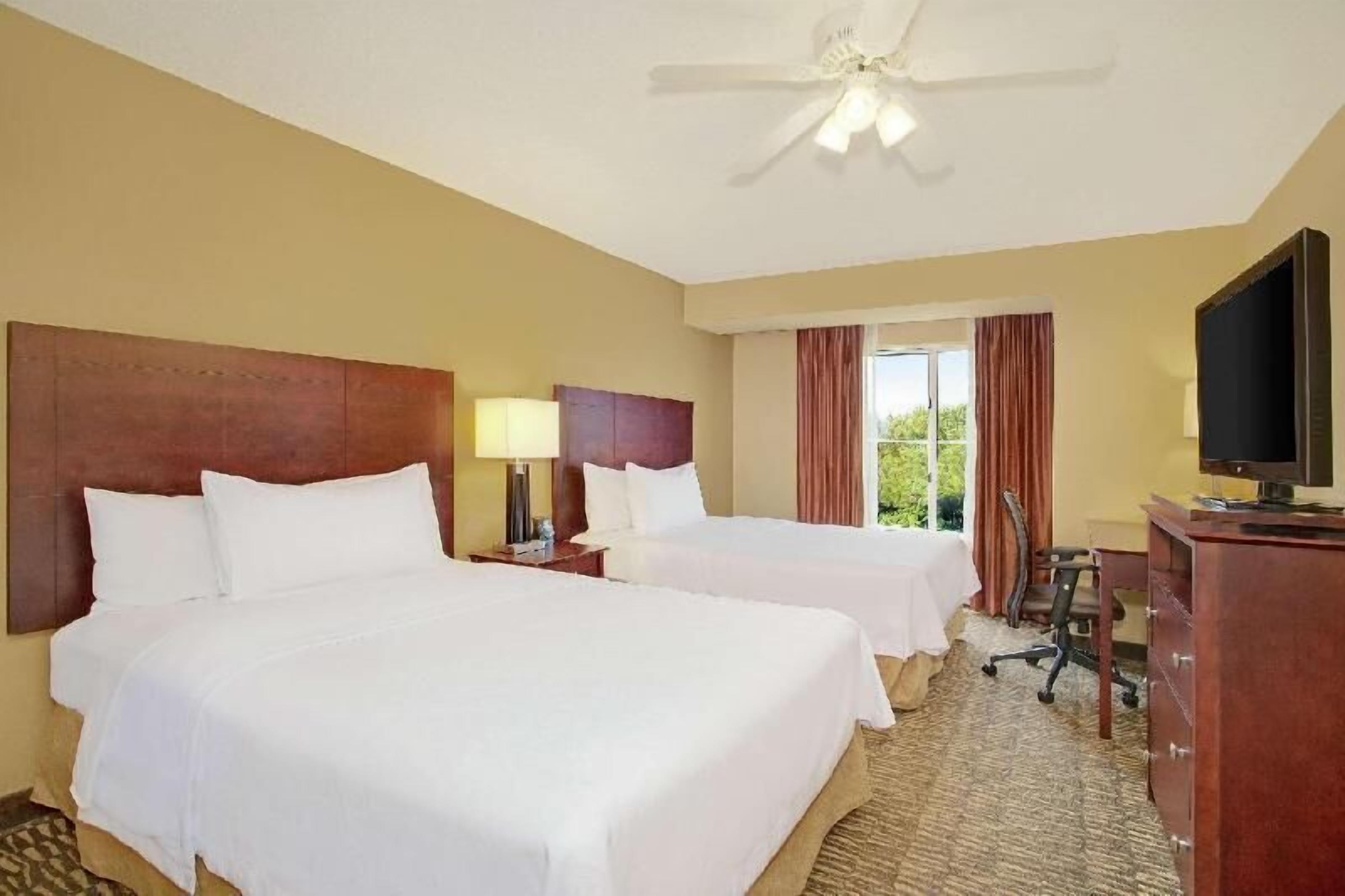 Premium bedding, down duvets, pillow-top beds, blackout curtains