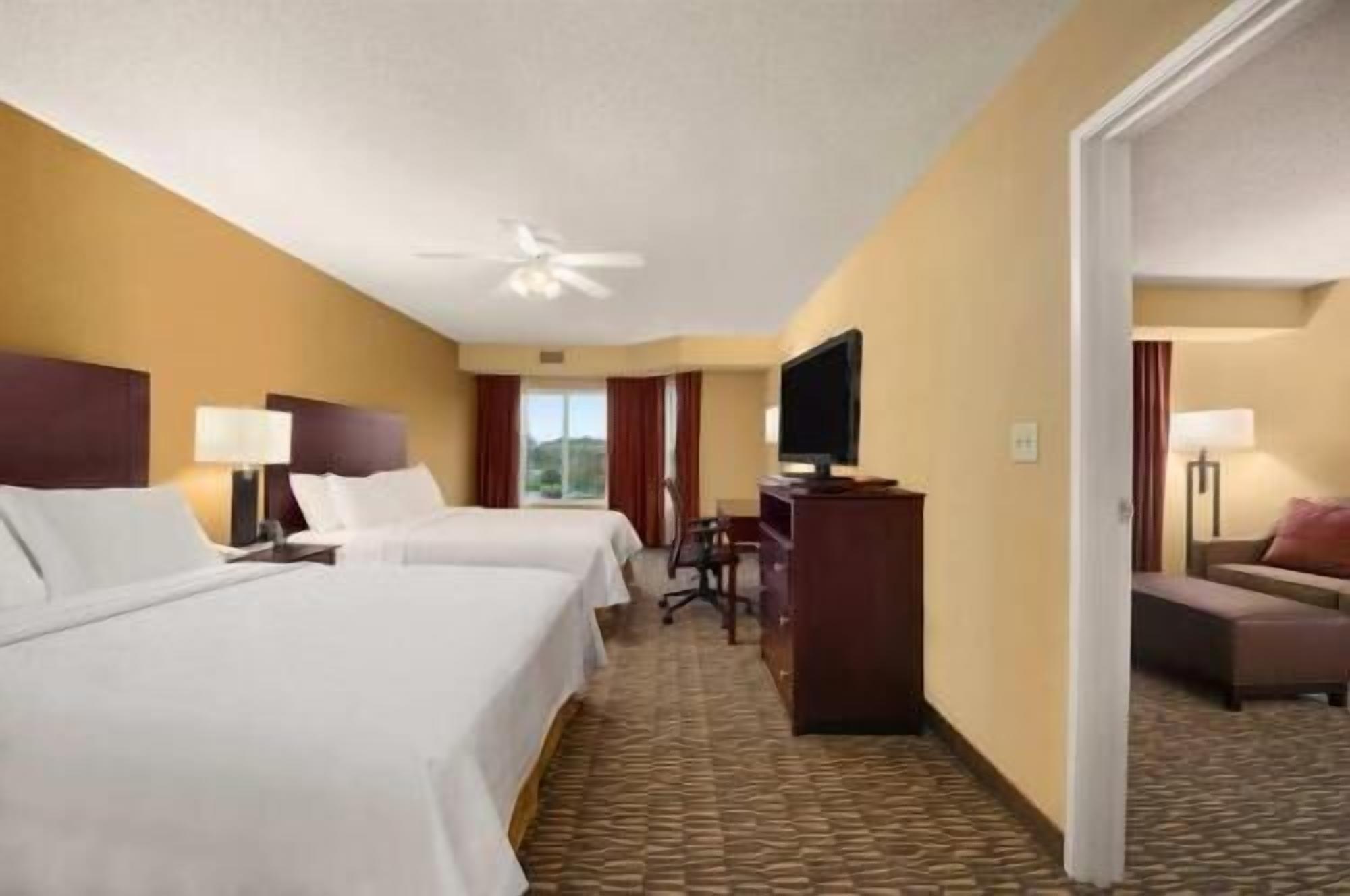 Premium bedding, down duvets, pillow-top beds, blackout curtains