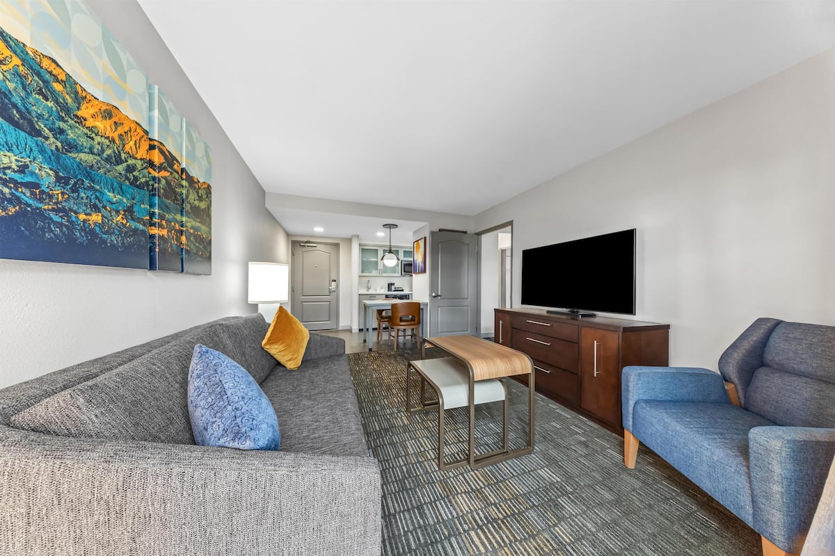 Suite, 2 Queen Beds, Non Smoking | Living area | 42-inch flat-screen TV with cable channels, TV, video-game console