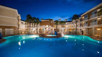 Outdoor pool, open 9:00 AM to 9:00 PM, pool loungers