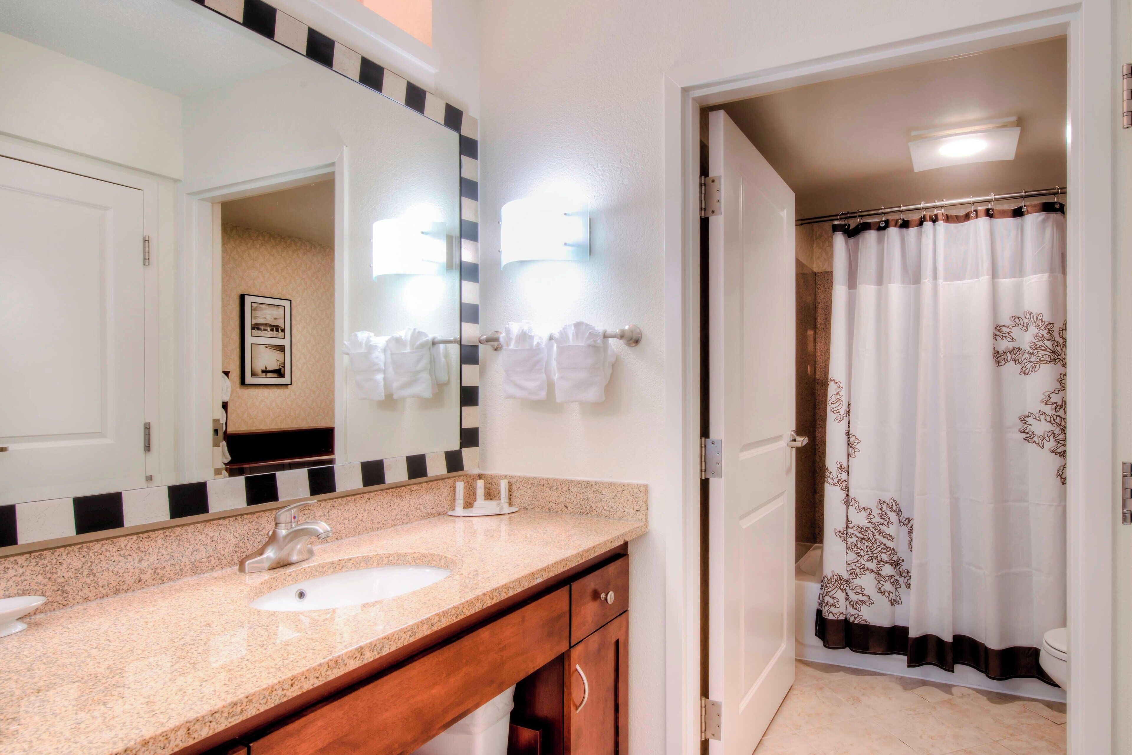 combined shower/bathtub, free toiletries, hair dryer, towels