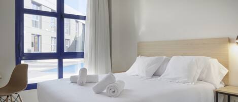 Blackout curtains, soundproofing, free WiFi, bed sheets