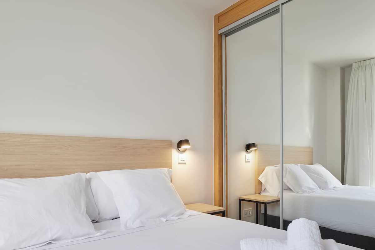 Blackout drapes, soundproofing, free WiFi, bed sheets