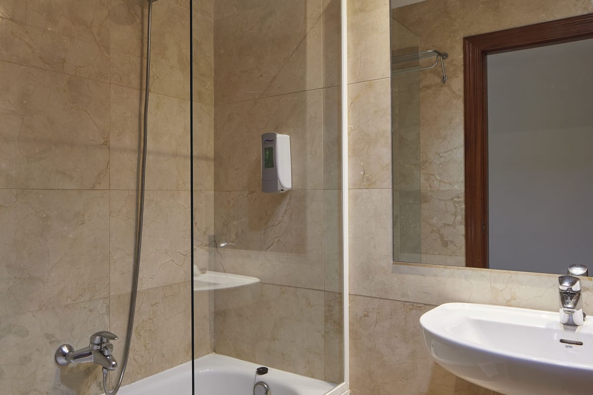 double room | bathroom | deep-soaking bathtub, free toiletries, towels