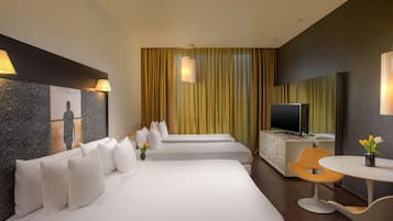 Family Quadruple Room (Nhow Friends & Family) | Down comforters, minibar, in-room safe, individually decorated