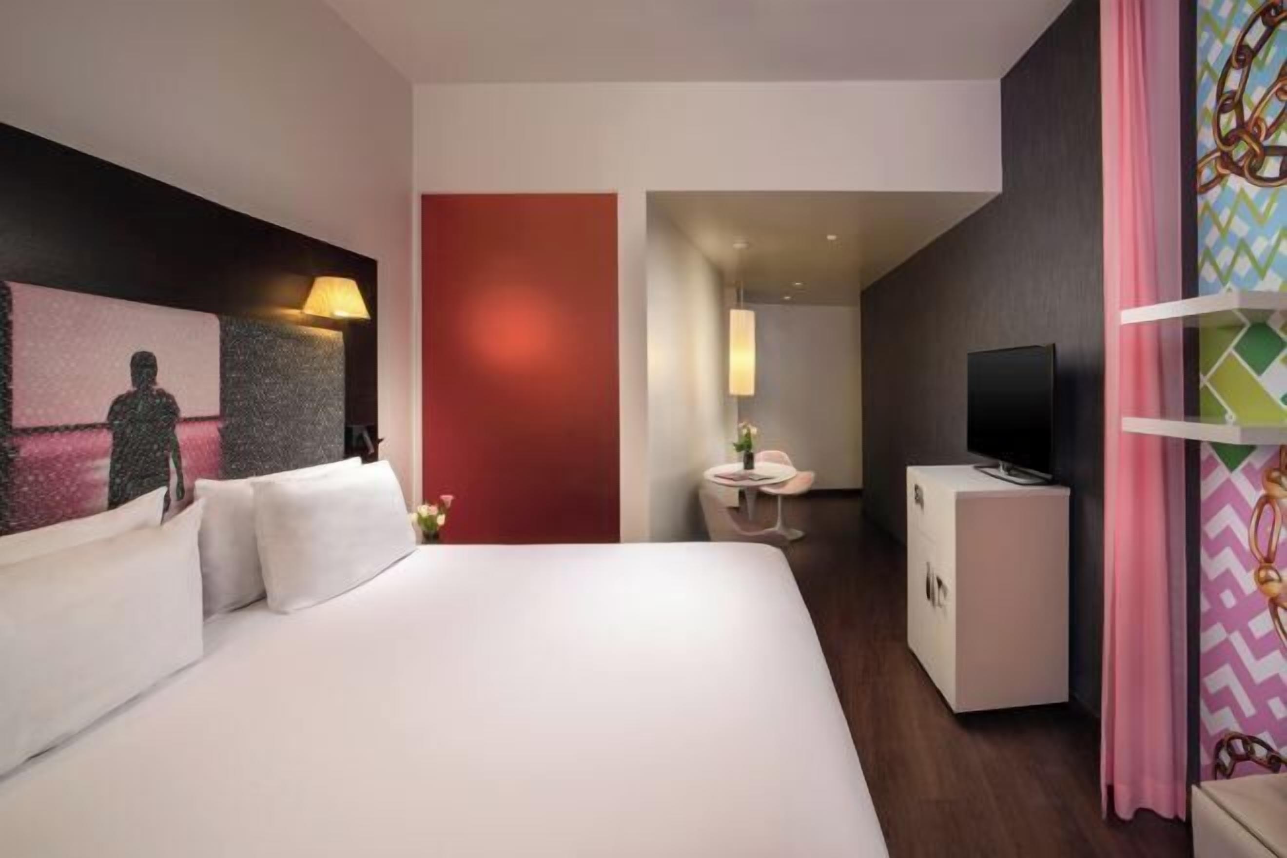 Dundyner, minibar, pengeskab på værelset, individuelt design