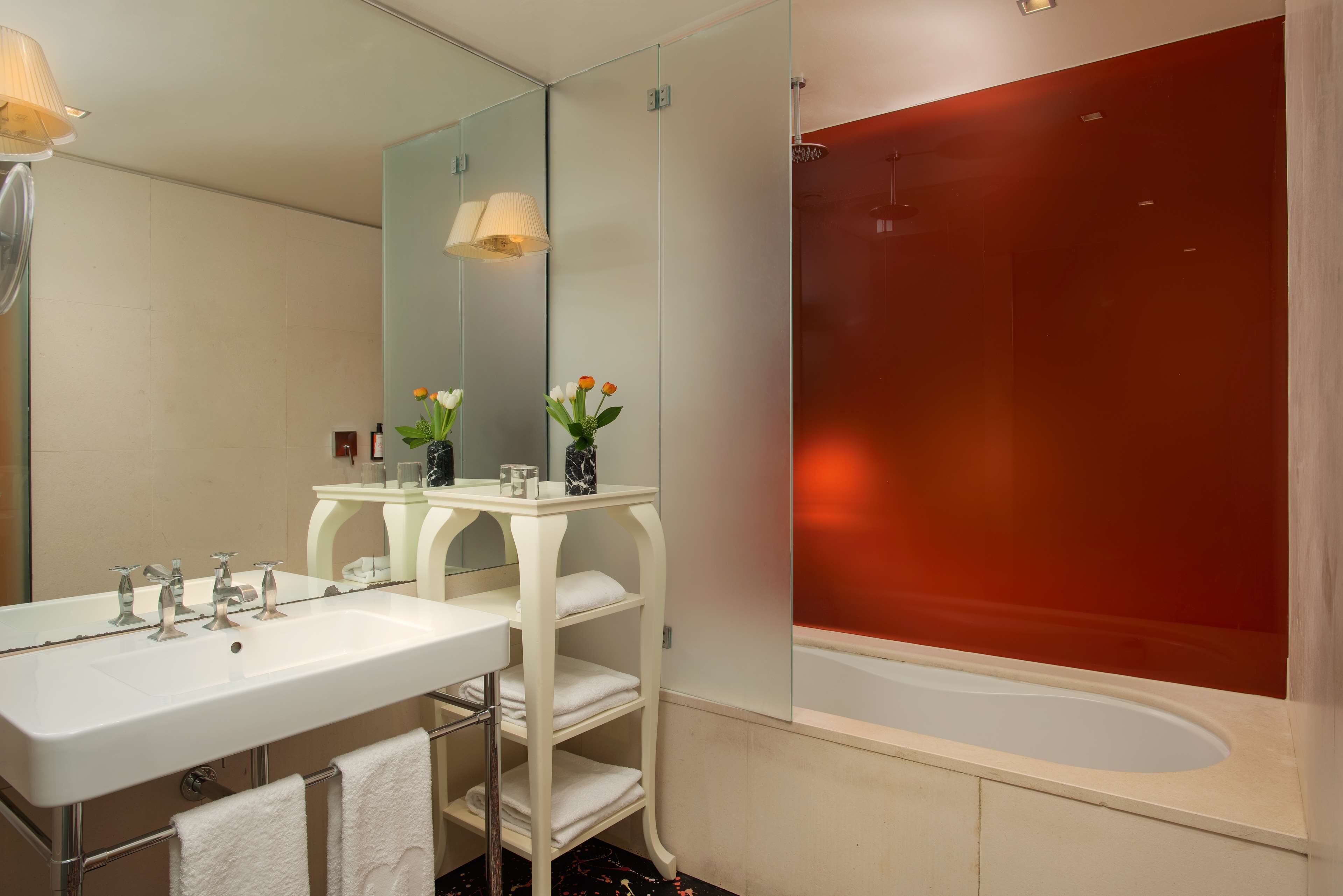 designer toiletries, hair dryer, bathrobes, bidet