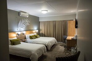 Premium bedding, in-room safe, individually decorated