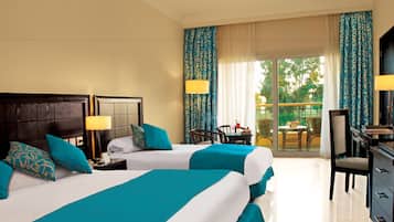 Standard Room, 3 Twin Beds, Garden View | Minibar, in-room safe, desk, iron/ironing board