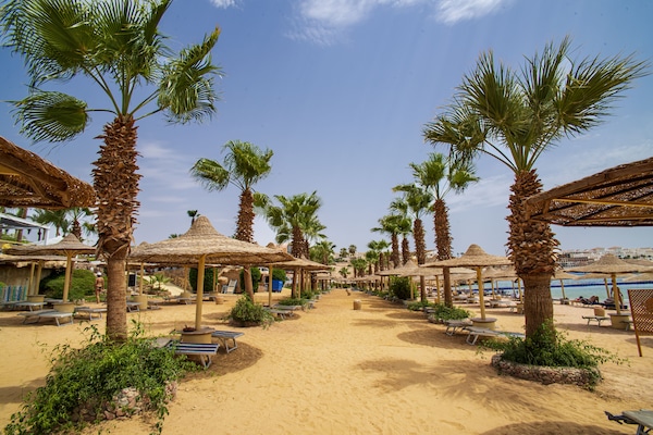 Private beach nearby, free beach shuttle, sun loungers, beach umbrellas