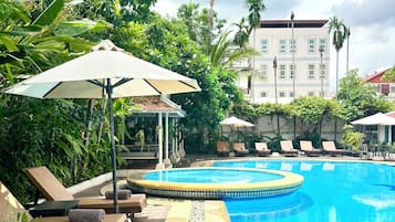 Outdoor pool, open 7:00 AM to 9:00 PM, free cabanas, pool umbrellas