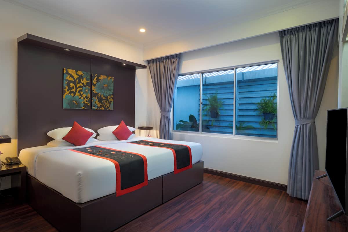 1 kamar tidur, seprai antialergi, minibar, dan brankas
