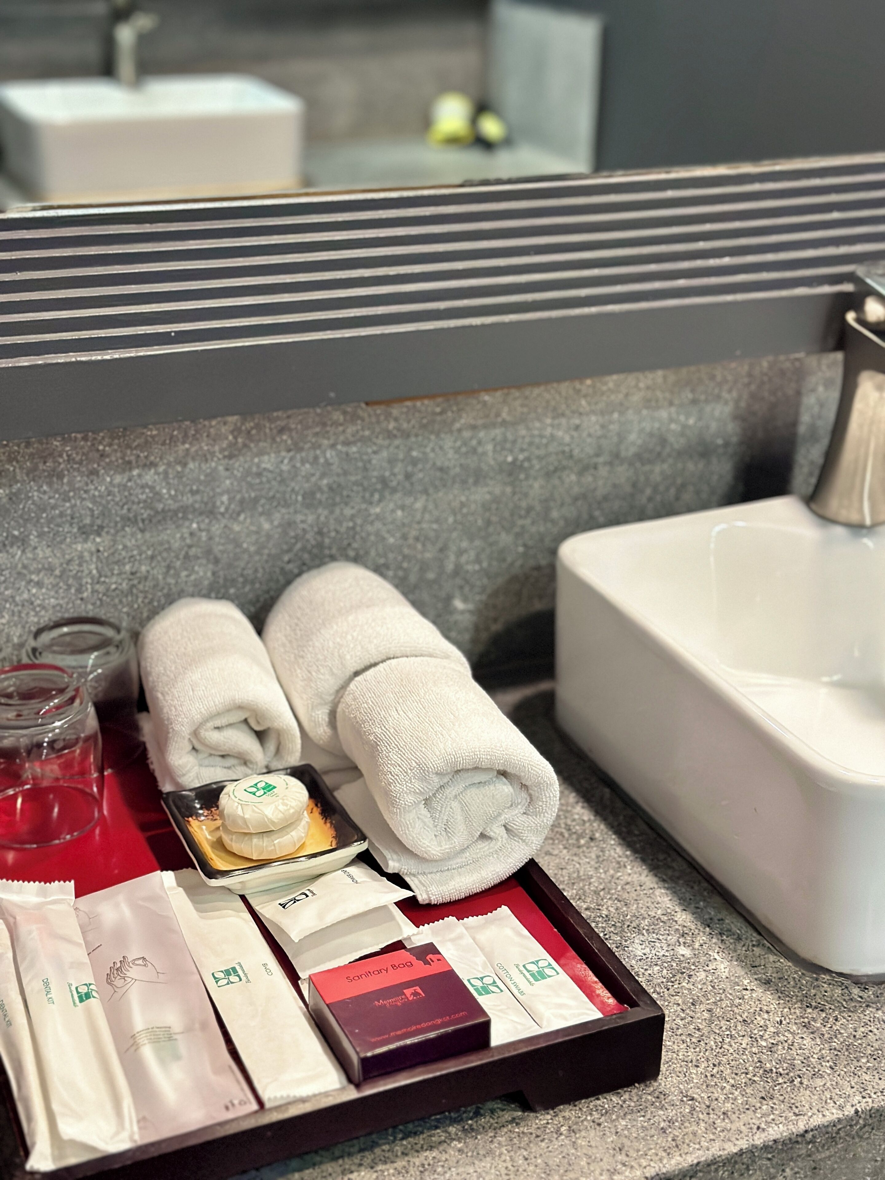 separate bathtub and shower, rainfall showerhead, designer toiletries