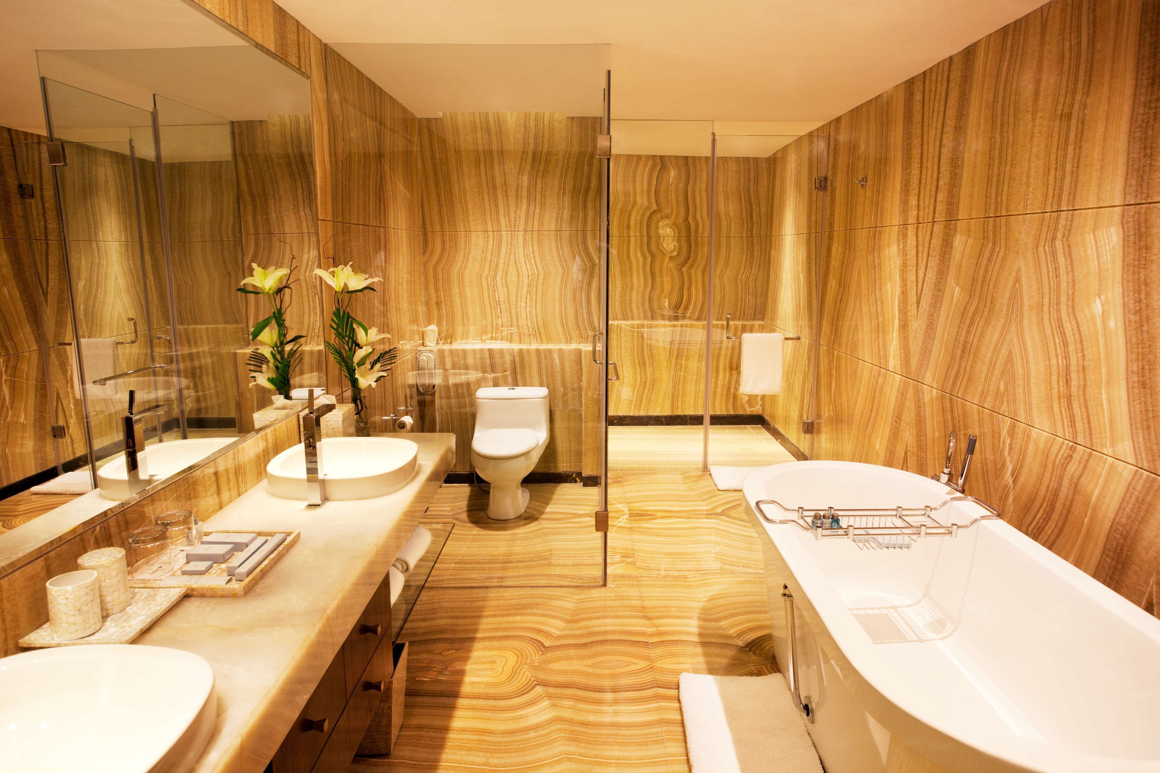 presidential suite | bathroom | eco-friendly toiletries, hair dryer, bathrobes, slippers