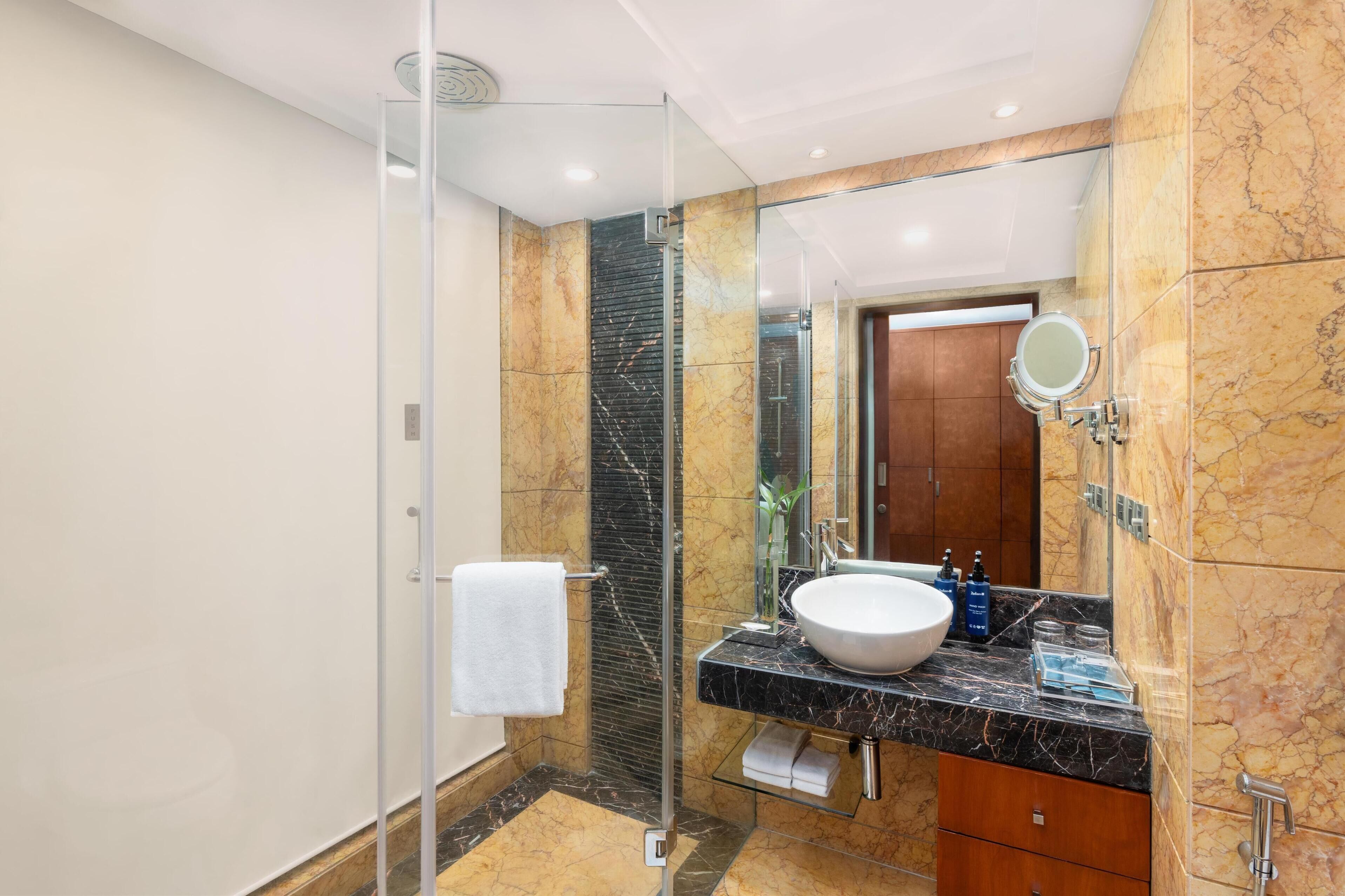 Eco-friendly toiletries, hair dryer, bathrobes, slippers
