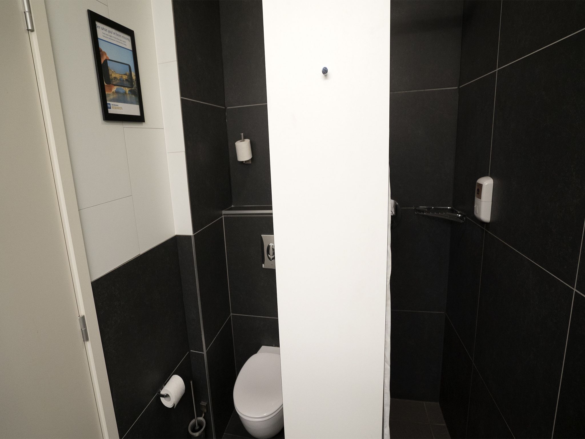 shower, rainfall showerhead, hair dryer, towels