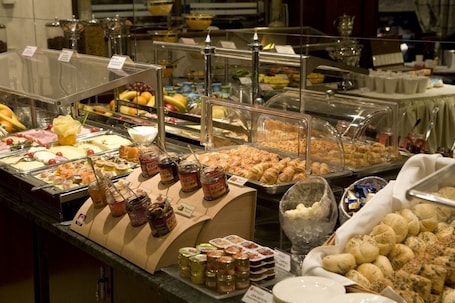 Daily buffet breakfast for a fee. Ramada Hotel & Suites by Wyndham Bucharest North
