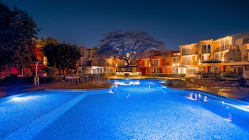 Outdoor pool, pool umbrellas, sun loungers