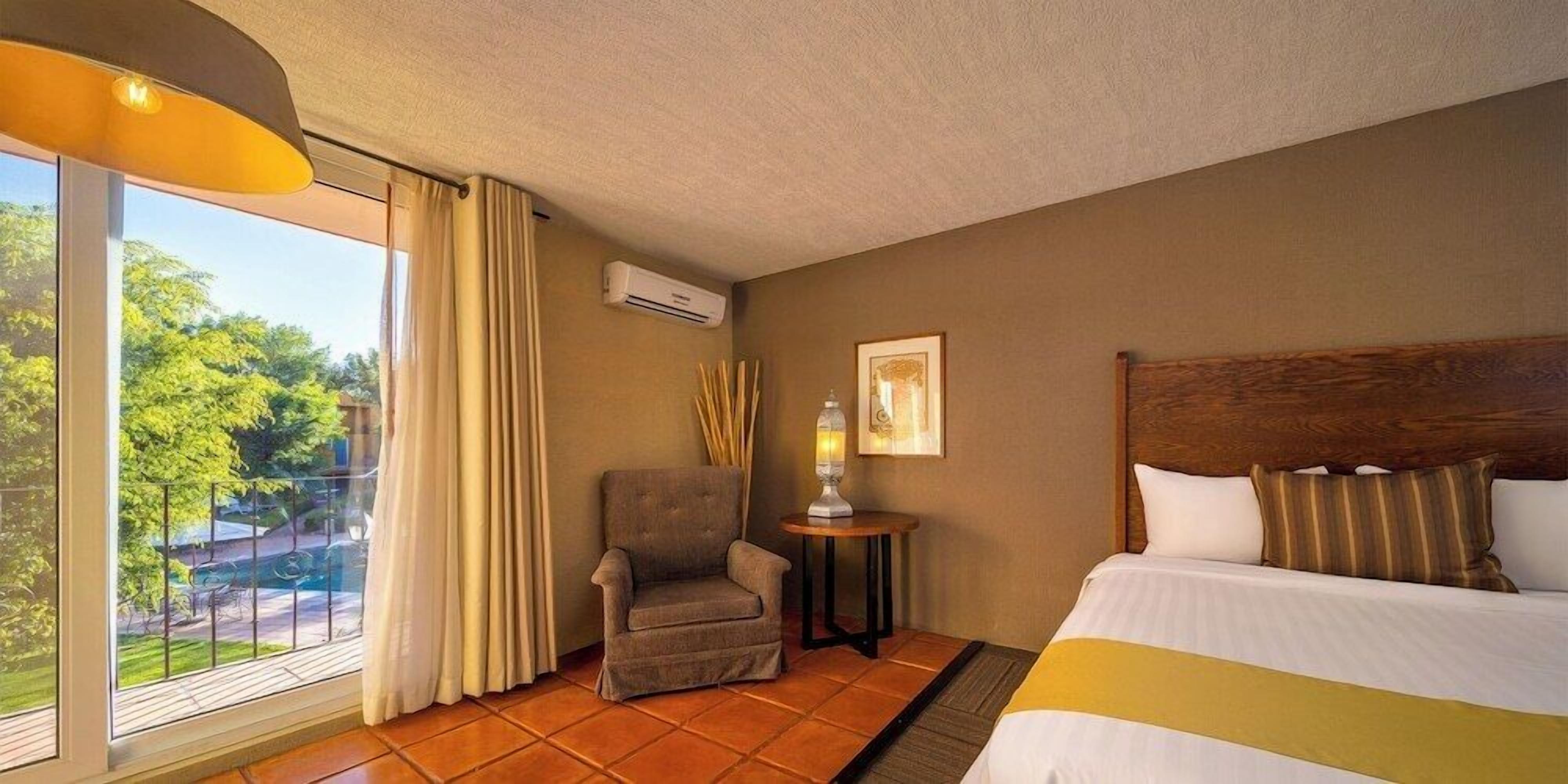 Premium bedding, down comforters, in-room safe, desk