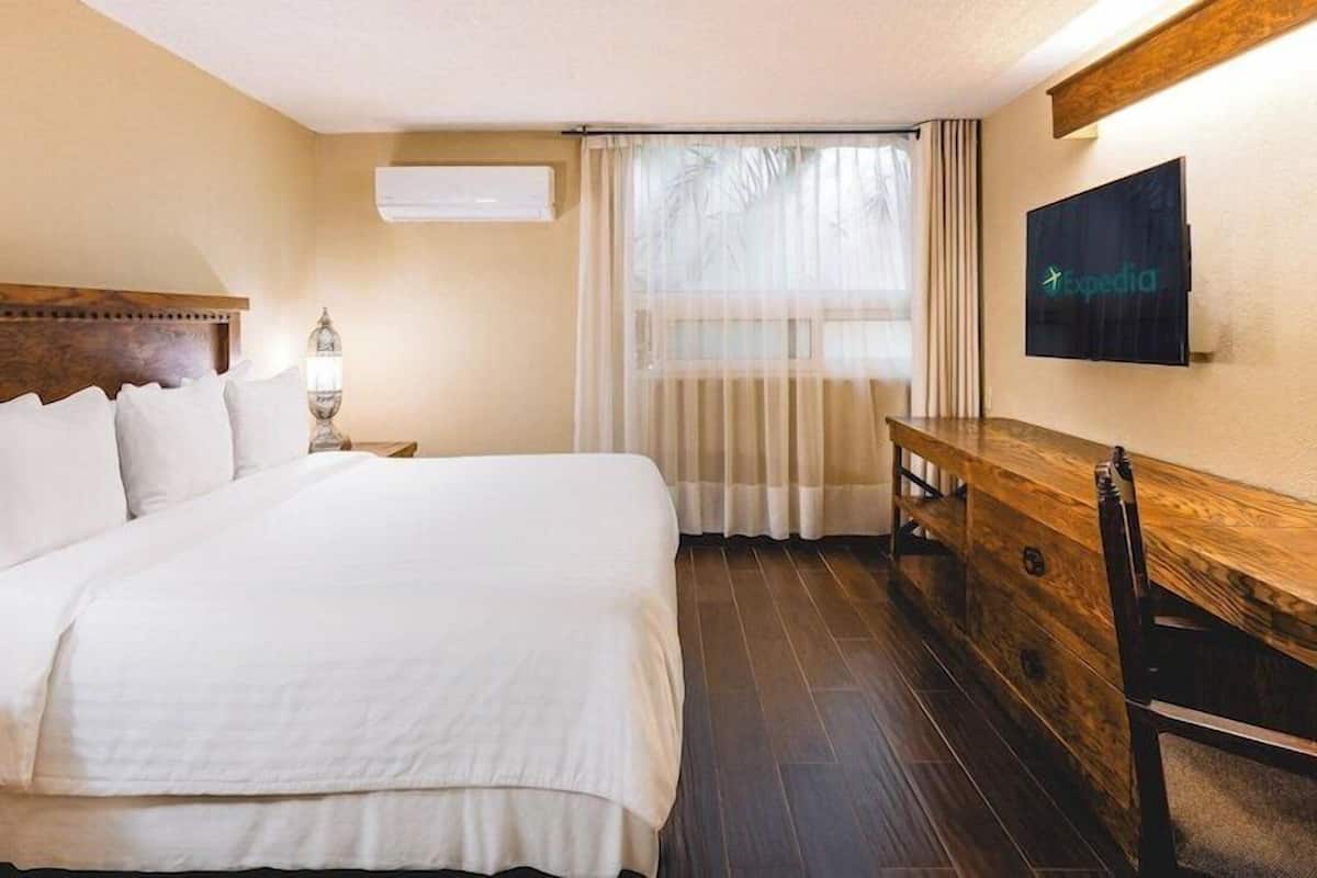 Premium bedding, down comforters, in-room safe, desk
