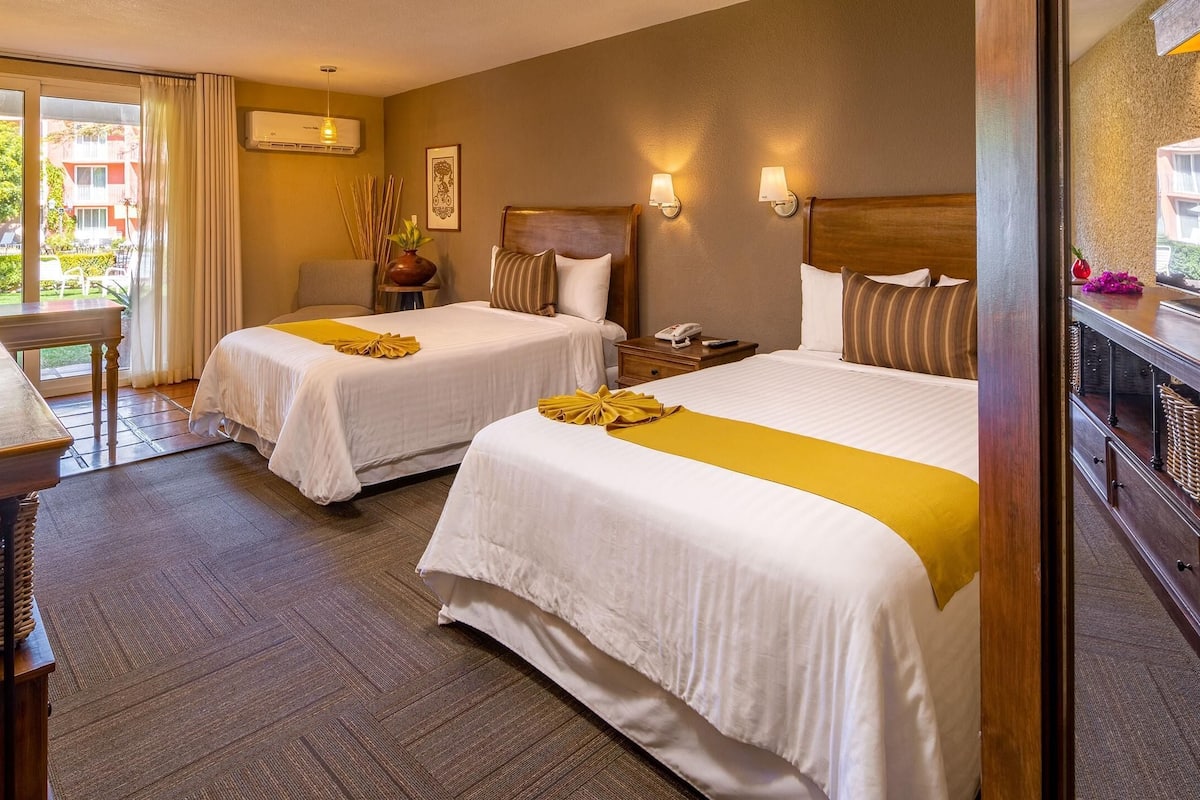 Premium bedding, down duvets, in-room safe, desk