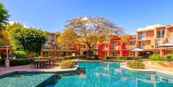 Outdoor pool, pool umbrellas, sun loungers