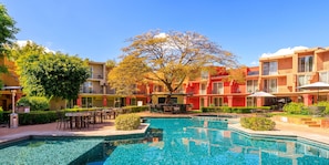 Outdoor pool, pool umbrellas, sun loungers