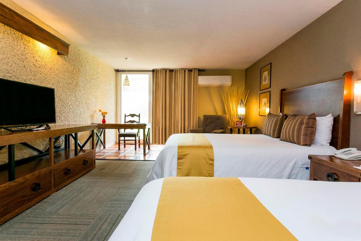 Premium bedding, down duvets, in-room safe, desk