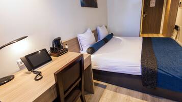 Basement Double Room Limited View | Minibar, in-room safe, desk, iron/ironing board